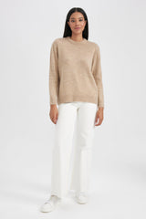 كنزة Defacto لون بيج فاتح