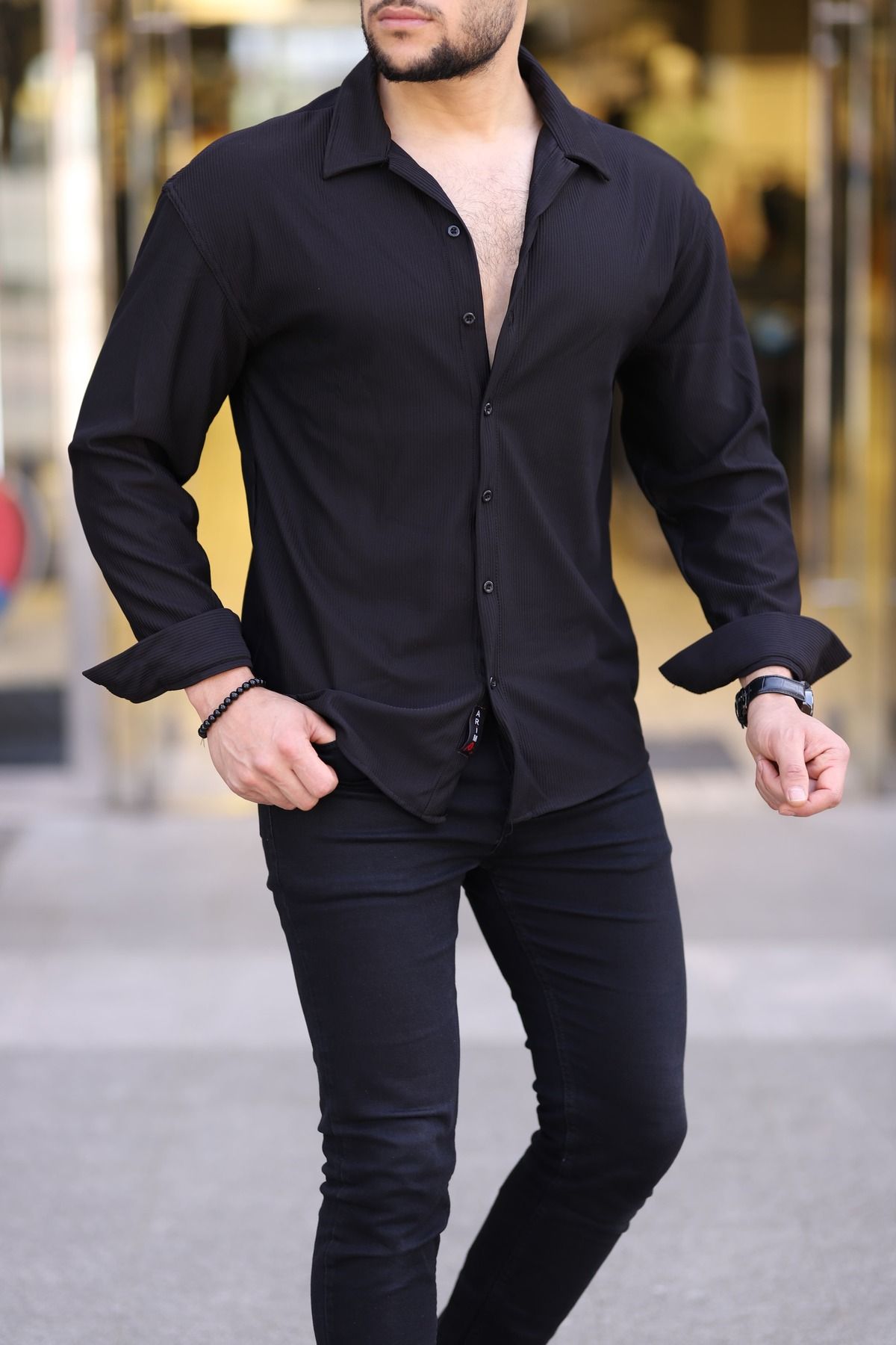 قميص efraim giyim لون أسود