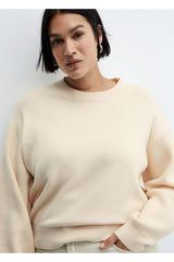 كنزة MANGO لون بيج فاتح