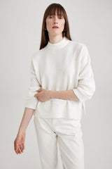 كنزة Defacto لون بيج فاتح