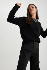 كنزة Defacto لون أسود