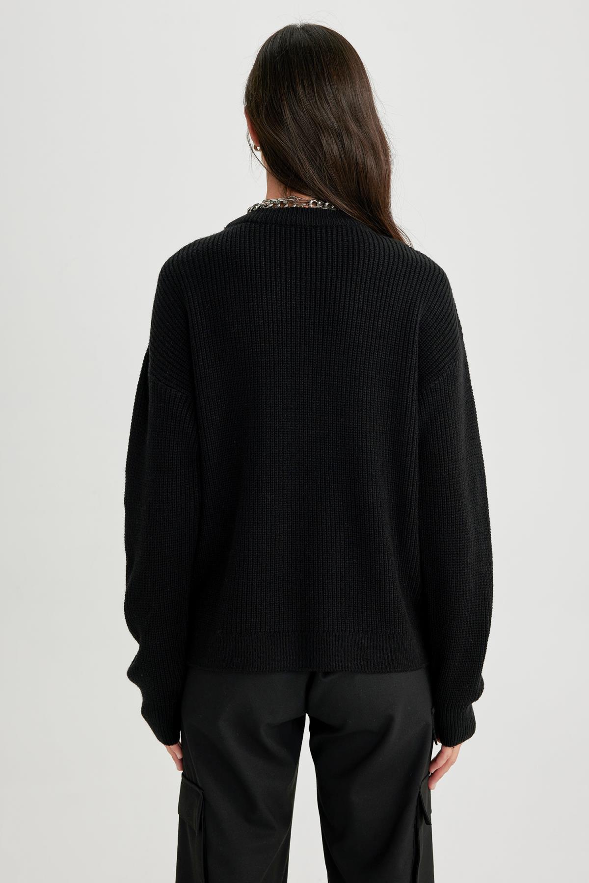 كنزة Defacto لون أسود