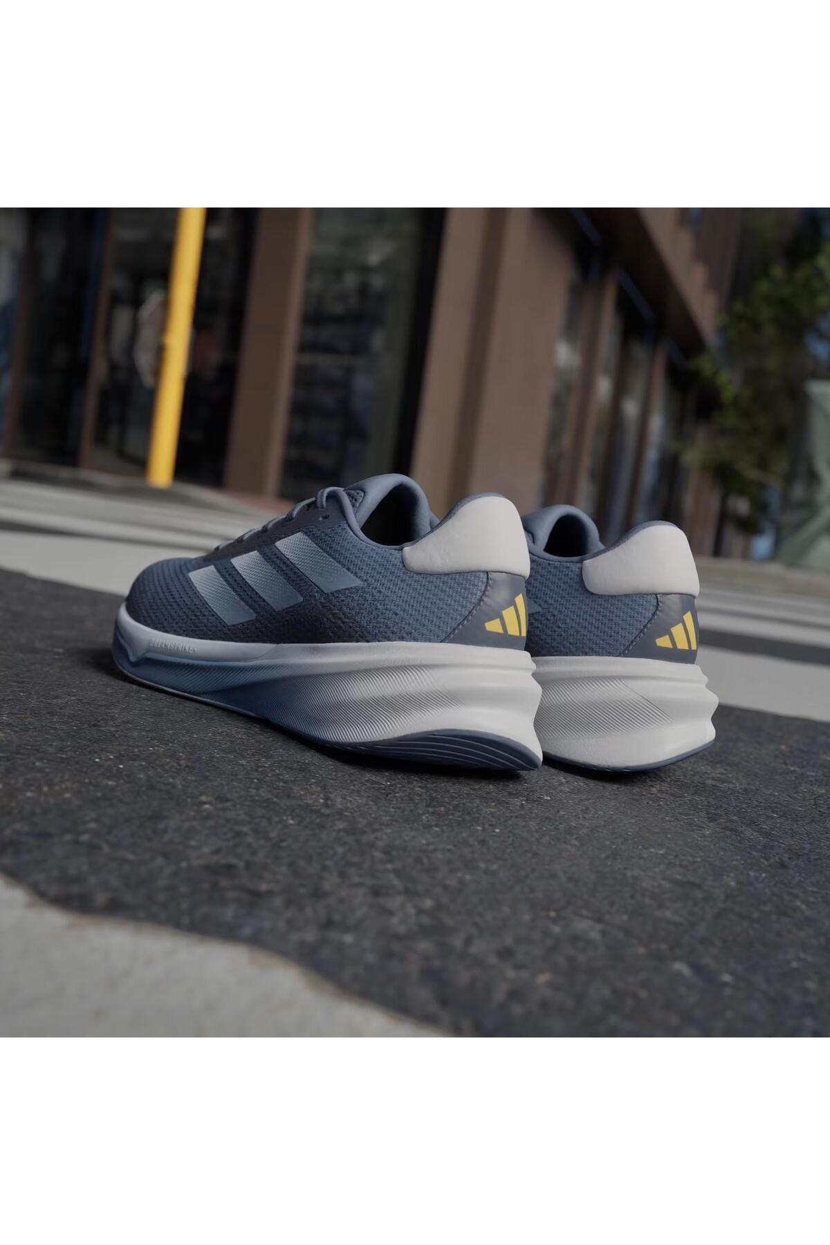 حذاء الجري adidas لون أزرق