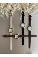 ساعة QUARTZ لون بيج