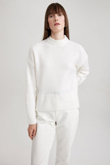 كنزة Defacto لون بيج فاتح