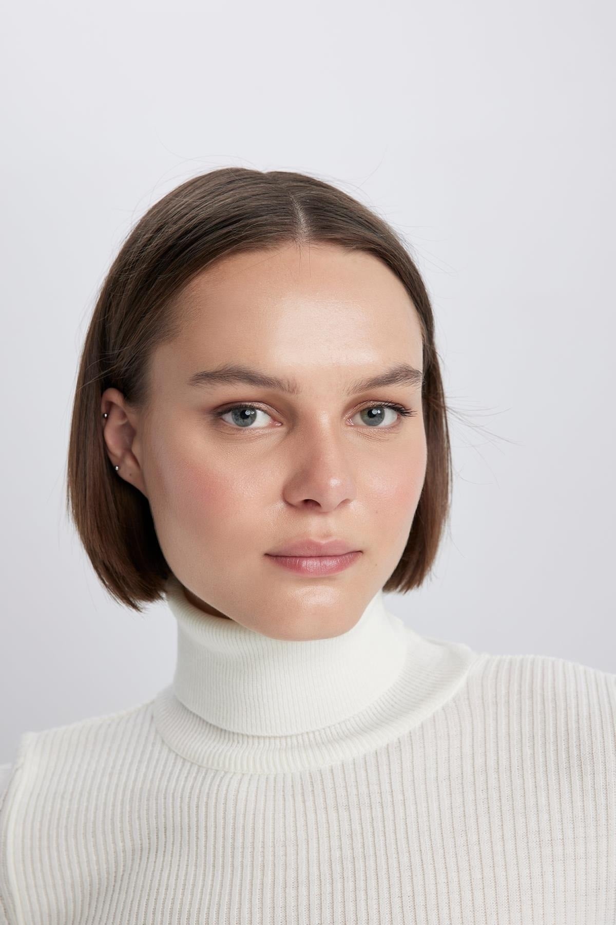 كنزة Defacto لون بيج فاتح