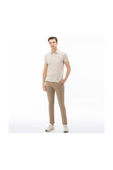 بنطال Lacoste لون بيج